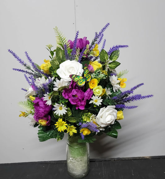 Lavender, white faux roses, yellow sweetheart roses desighned on a styrofoam cone for a 3 inch wide Grave vase , cemetery flowers
