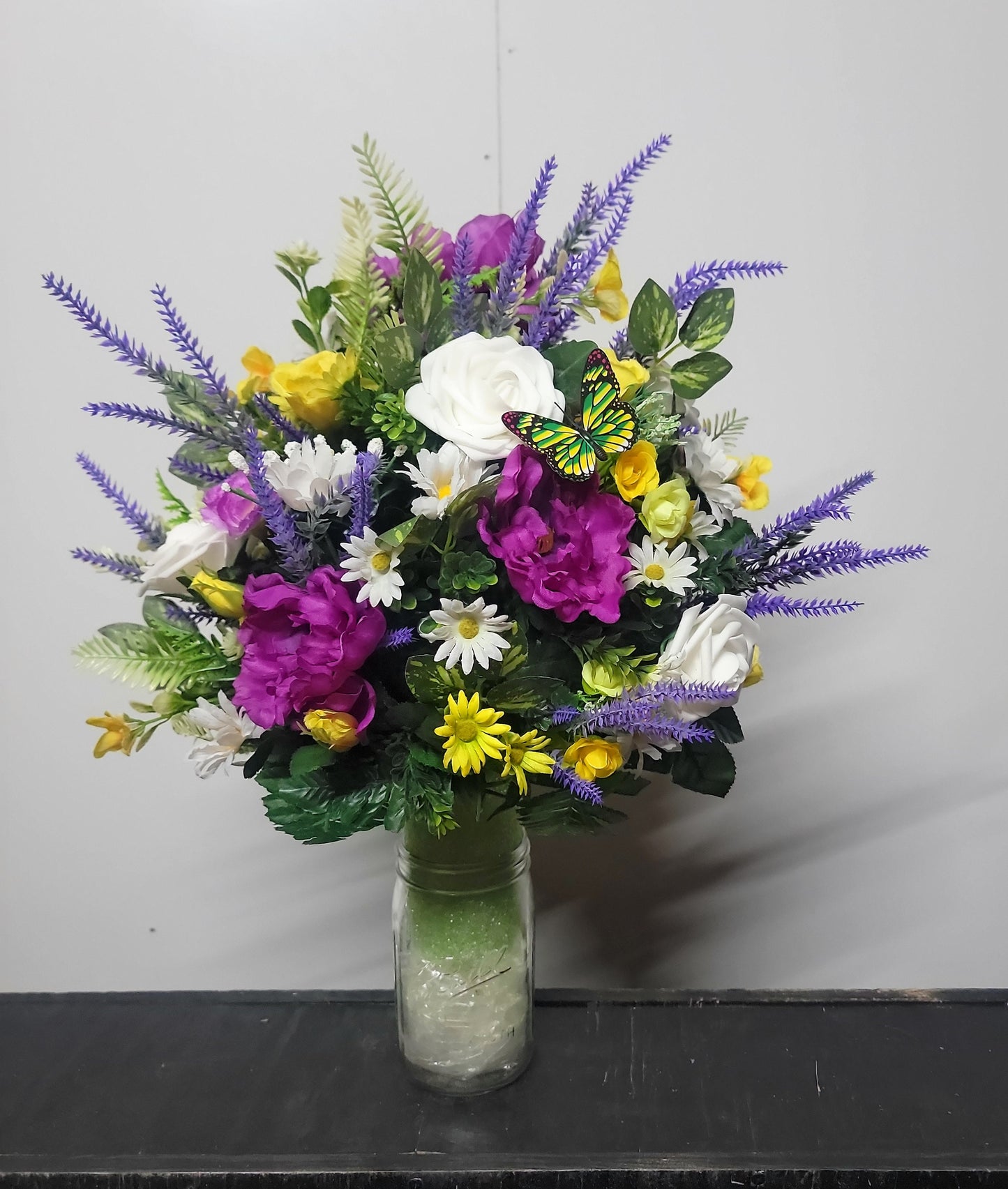Lavender, white faux roses, yellow sweetheart roses desighned on a styrofoam cone for a 3 inch wide Grave vase , cemetery flowers