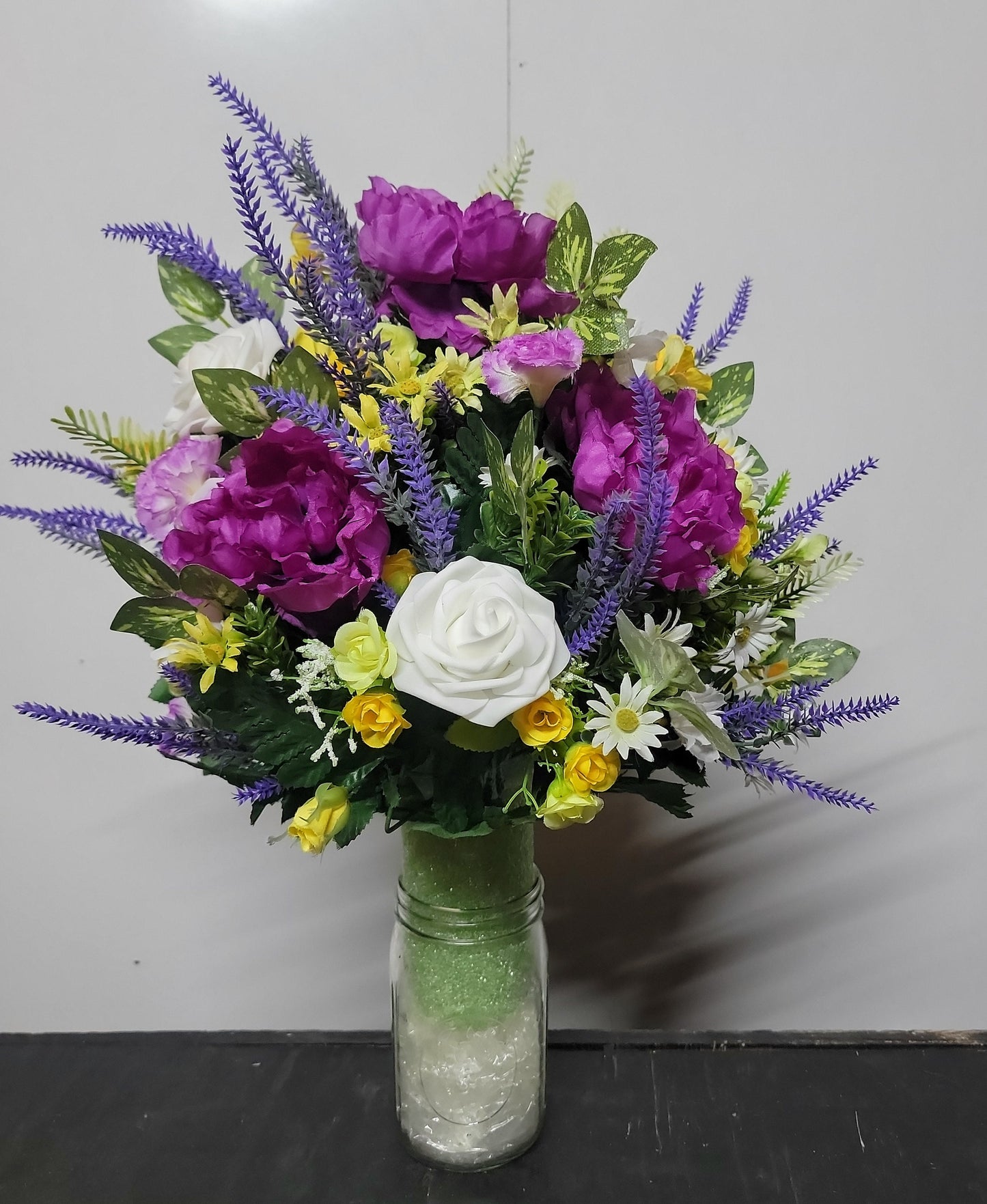 Lavender, white faux roses, yellow sweetheart roses desighned on a styrofoam cone for a 3 inch wide Grave vase , cemetery flowers